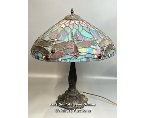 A large Tiffany style stained glass, leaded lamp shade on metal base. Lamp shade decorated with Dragonfly and marbled glass p