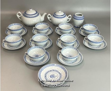 A Chinese blue &amp; white part tea service of ten cups, twelve saucers, tea pot, sugar bowl and jar without lid, all in very