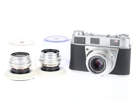 A Kodak Retina IIIS 35mm Rangefinder Three Lens Camera Outfit, comprising a Kodak Retina IIIS 35mm rangefinder camera body, i