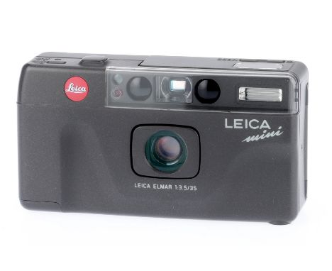 A Leica Mini Automatic Compact Camera, grey, serial number 1835602, body G, powers up, takes a picture, flash works.
