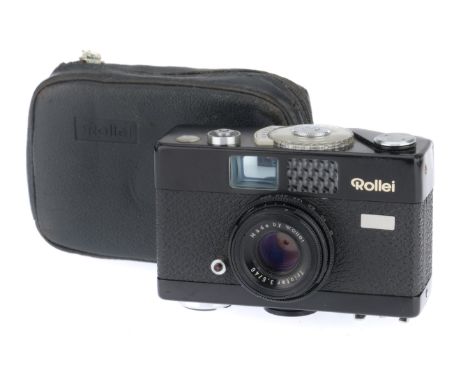 A Rollei 35B Compact Camera, black, body G, shutter clicks but doesn't open, advance mechanism works, light meter responds, w