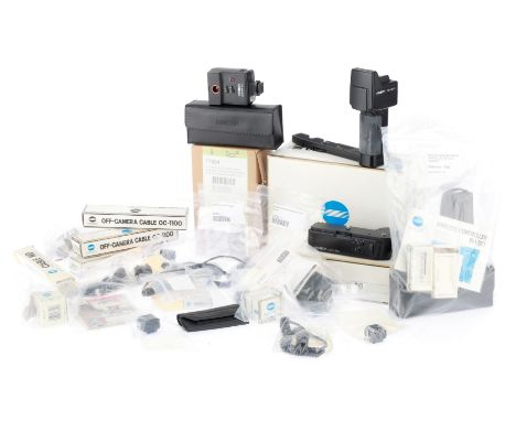 A Selection of Minolta Flash Accessories, to include two CG-1000 control grip sets, control cables, curly cords, IR-1 Wireles