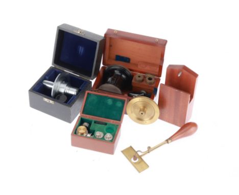 Collection of Microscope Accessories, to include a Swift goniometer eyepiece, Buusch vertical illuminator, 19th century bench