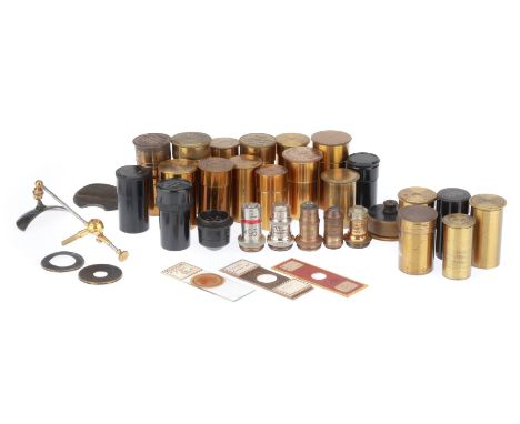 Collection of Microscope Objectives, including 14 in cans, 5 with no cans, 5 empty cans, a side reflector and other items