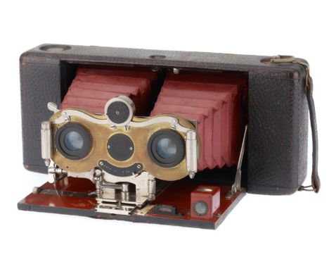 A Kodak Stereo Hawk-Eye Camera, black, leather covered, F-G, opens and extends, shutter works, one iris needs attention.
