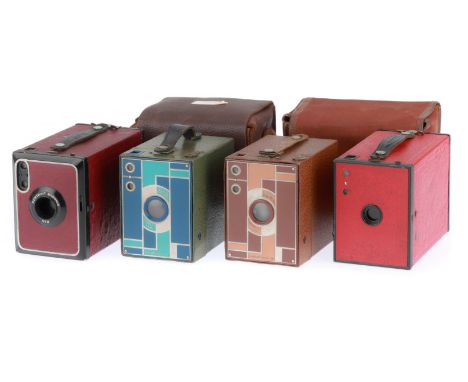 A Group of Colour Box Cameras, comprising a Beau Brownie blue/green, small dent to front, in case, a Beau Brownie brown, a Po