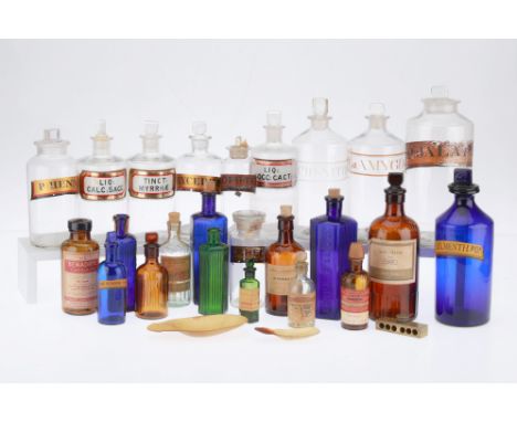 Collection of 24 Chemist Bottles including a large Syrup bottle with peg stopper and broken pontil mark, along with 4 other b