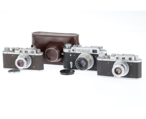 A Group of FED Rangefinder Cameras, Comprising a FED 1c, serial number 92020, body G, rangefinder patch moves, shutter works,