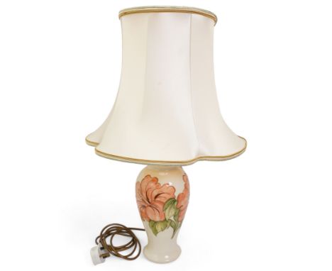 Moorcroft baluster form table lamp, decorated in the Hibiscus pattern against a cream ground, with shade, H29cm excluding fit