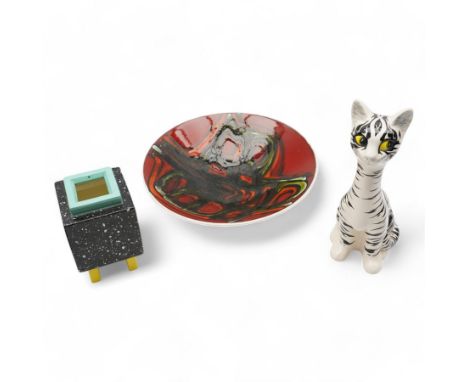Poole pottery bowl, decorated internally with an abstract black and orange pattern, against a red ground, D27cm, together wit