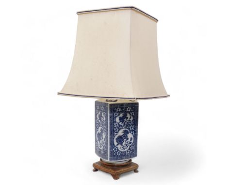 Chinese table lamp, of rectangular form, decorated with alternating panels of dragons playing with string in blue and white, 