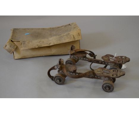 A pair of Victorian Roller Skates, in box (P).