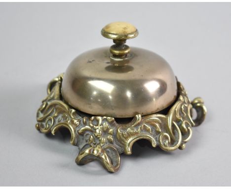 A Late 19th/Early 20th Century Brass Desk or Counter Bell with Twist Top Button Mechanism, Working Order, Three Scrolled Feet