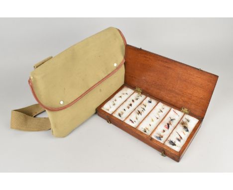 A Vintage Mahogany Six Section Fly Box with Contents together with a Canvas Fishermans Bag