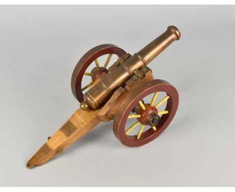 A Mid 20th Century Bronze and Wooden Model of a Twelve Pounder Field Gun Used by The Royal Artillery, 34cms Long