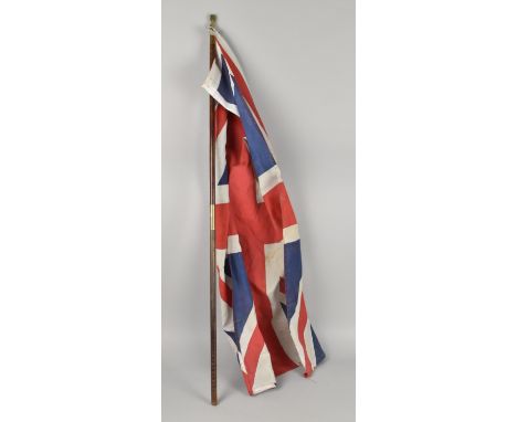 A Vintage Wooden Shotgun Cleaning Rod together with a Printed Union Jack
