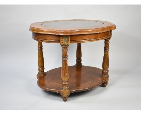 A Mid 20th Century Ormolu Mounted Oval Coffee Table with Turned Supports and Stretcher Shelf, 72cms Wide