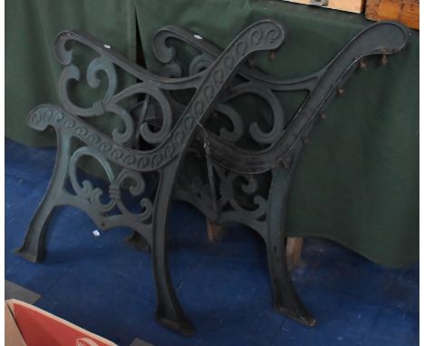 A Pair of Green Painted Cast Metal Bench Ends