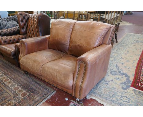 Brown leather 2 seater sofa