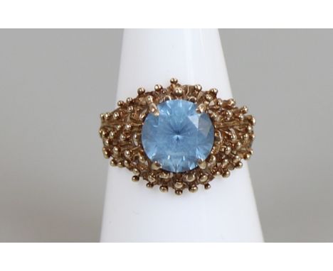 Gold blue topaz set ring, size N