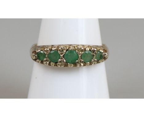 Gold emerald set ring, size O½