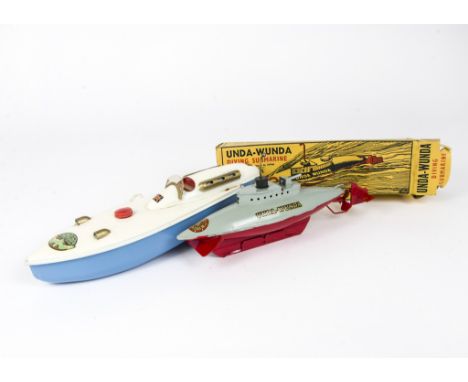 Sutcliffe tinplate clockwork boats, Unda -Wunda Diving Submarine, in red and grey, in original yellow line drawing picture bo