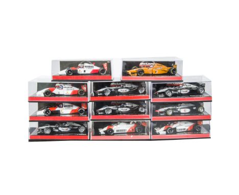 Minichamps 1:43 Scale F1 Models, A cased collection of McLaren Edition 43 models, comprising, 974310/034305/974390,014304/004