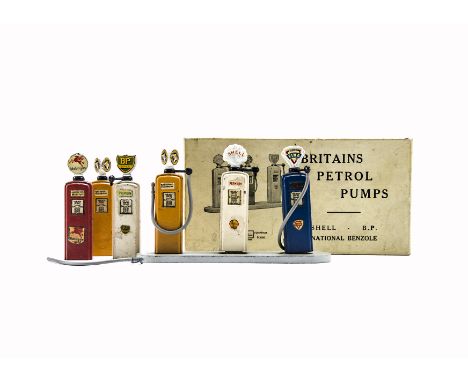 Britains 101V Petrol Pump Set, comprising Shell, National and Fina Pumps on stand  with three hoses, additional National, BP 