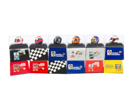 Minichamps Helmet Collection, A cased collection of 1:8 scale Formula 1, drivers helmets, mostly 1990s, VG-E, Cases (7 minus 