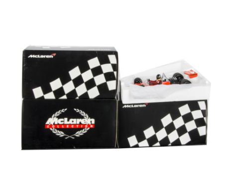 Minichamps 1:18 Scale Formula 1 Models, A boxed group of McLarens, comprising, 761811, J Hunt 1976, 741805, Fittipaldi 1974, 