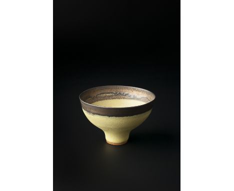 Lucie Rie (Austria, 1902-1995) Footed bowl in yellow glaze and with manganese rim impressed potter's seal 6.6cm high, 10.5cm 