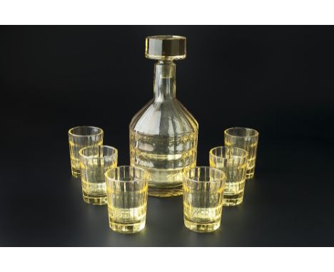 Art Deco Liquer set, in yellow cut glass probably French comprising decanter and six drinking glasses the decanter 23.5cm hig