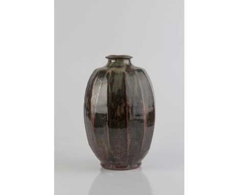 Mike Dodd (British, b.1943) Vase tenmoku glaze, faceted sides impressed potter's seal 30.5cm high.