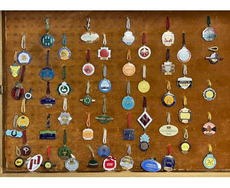 A collection of horse racing badges for racecourses and race clubs (53), well presented in glazed presentation case. Dating f