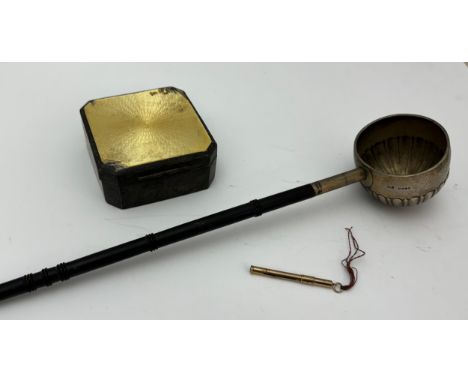 A silver toddy ladle with ebonised handle, a silver and enamel hinged box with wooden interior, width 8.5cm. and 9ct gold pro