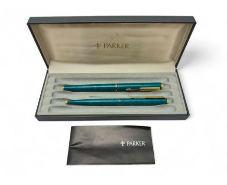 Parker Pens - A turquoise laque fountain pen and roller ball pen set