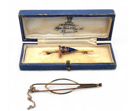 An enamel flag ensign bar brooch, length 50mm, tests as 9ct using XRF. And a 9ct gold clip 63mm in length , sponsor AJH, Birm