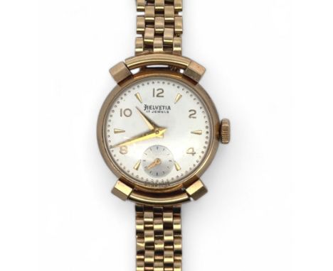 A 1860s Helvetia 9ct gold 21 jewels ladies watch on a 9ct gold bracelet. Silvered dial with sub secs dial, Arabic numeral and