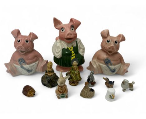 Three Wade Nat-West piggy banks, some Wade Whimsies and other small ceramic figures.