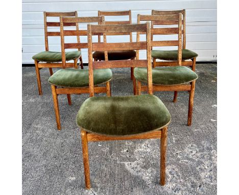 Mid-century set of six Scandinavian style oak dining chairs, unsigned with green upholstery. Mixed condition, one damaged. Pu