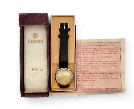 Tudor  - A vintage Gent's Tudor watch on a black leather strap. In original box with instructions.  Manual wind. Case diamete
