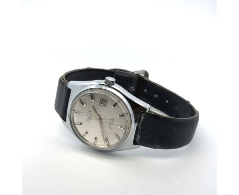 A Tissot Autolub Actualis watch with silvered dial and date display on a black leather strap. Dial diameter approx 30mm. Watc
