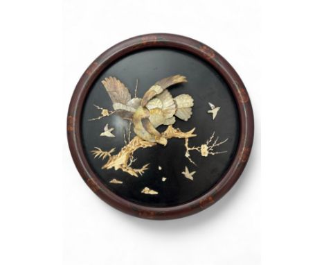 A Japanese Shibyama panel depicting an eagle, relief in bone and mother of pearl. One piece detached and needs re-sticking. D