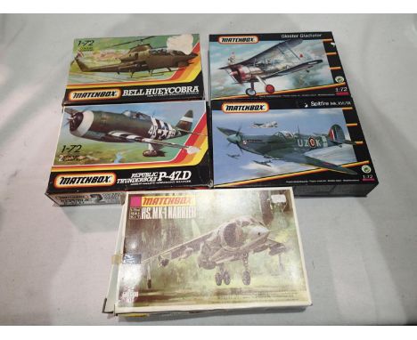 Five 1/72 scale Matchbox aircraft kits, Harrier, P47D, Spitfire, Gladiator and Huey Cobra, all appear complete/unchecked. UK 