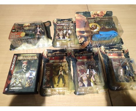 Six Pirates of The Caribbean figures by Zizzle, plus Dead Mans Chest card game, all near mint, wear to boxes. UK P&amp;P Grou