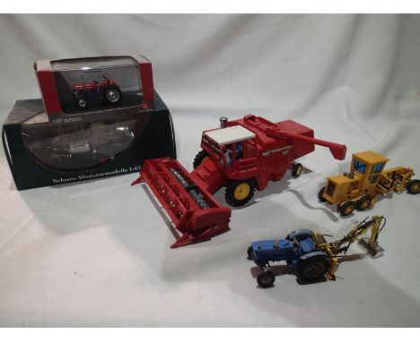 Britains Massey Ferguson combine harvester, Caterpillar road scraper, and Corgi Toys Ford tractor with back bucket, all in go