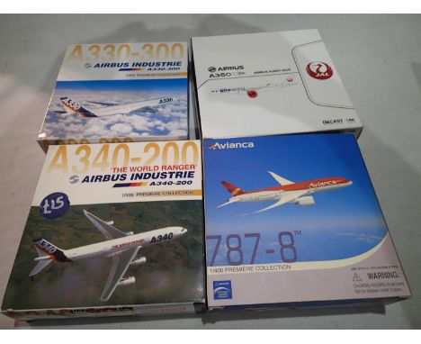 Four 1/400 scale airliners, various types, mostly Dragon, mostly excellent condition, boxed. UK P&amp;P Group 1 (£16+VAT for 