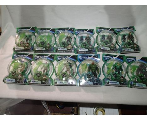 Twelve Mattel Green Lantern figures including four Hal Jordan, two Test Pilot, Hannu, Green Man, Stel, Kilowog, Abin-Sur, and