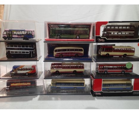 Twelve Corgi OOC buses and coaches, mostly Ribble or North England, excellent condition, storage wear to boxes. UK P&amp;P Gr