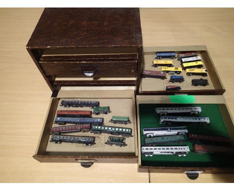 N gauge selection of Continental and American outline wagons and coaches, all housed in a four drawer storage box. UK P&amp;P